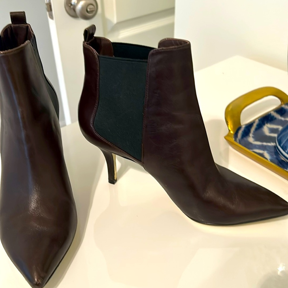 Brown leather, Michael Kors booties. Elastic side, which make it easy on-off.